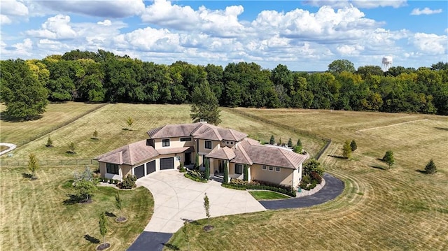 birds eye view of property featuring a rural view