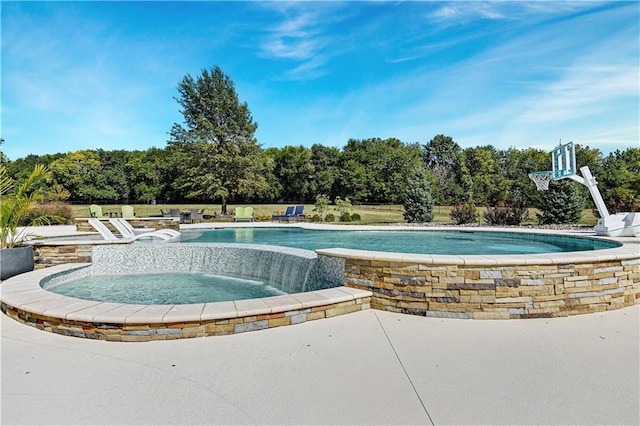 view of pool with pool water feature