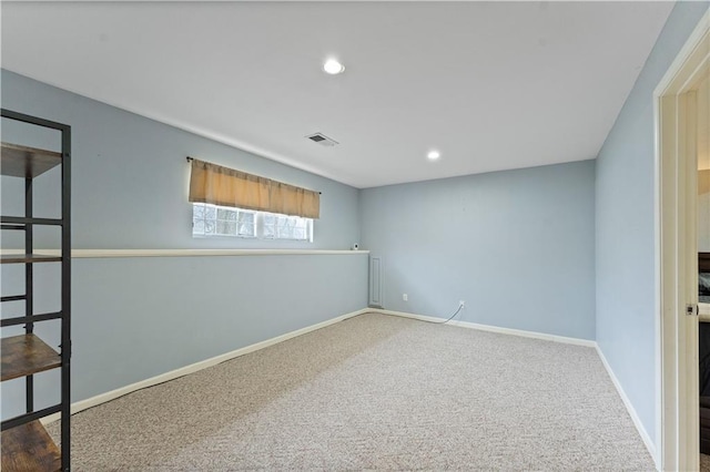 unfurnished room featuring carpet flooring