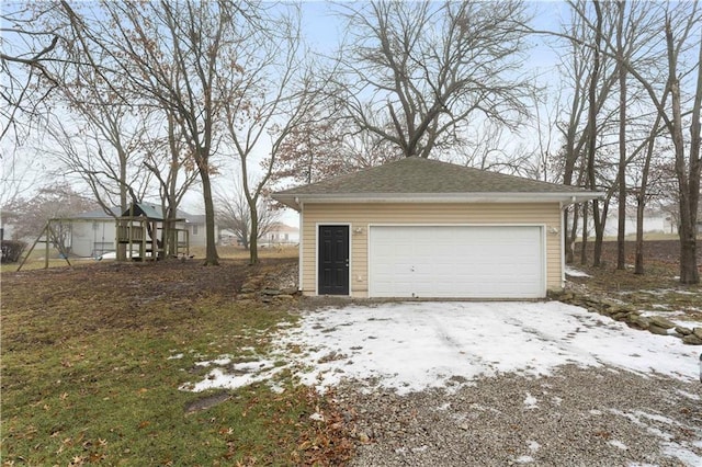 view of snow covered garage