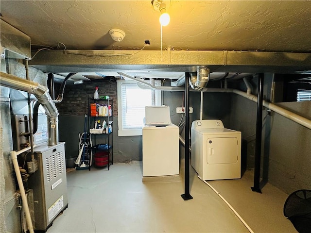 basement with independent washer and dryer and heating unit