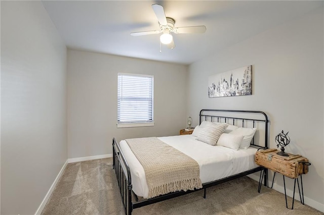 bedroom featuring baseboards, carpet, and a ceiling fan