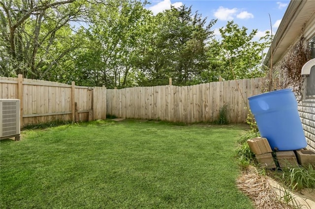 view of yard featuring central AC unit