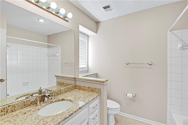 bathroom with vanity, visible vents, a textured ceiling, tile patterned floors, and toilet