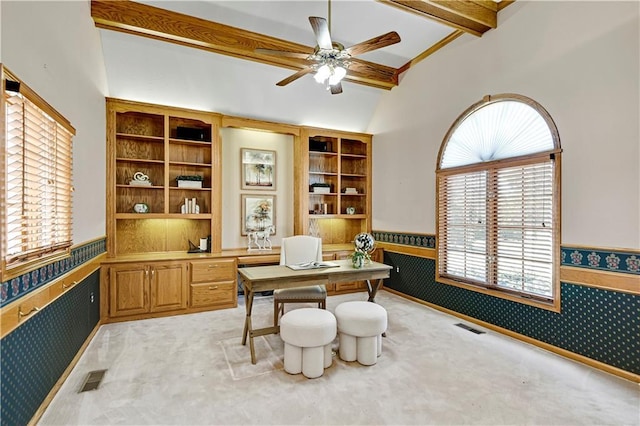 office space with a wainscoted wall, light colored carpet, wallpapered walls, and visible vents