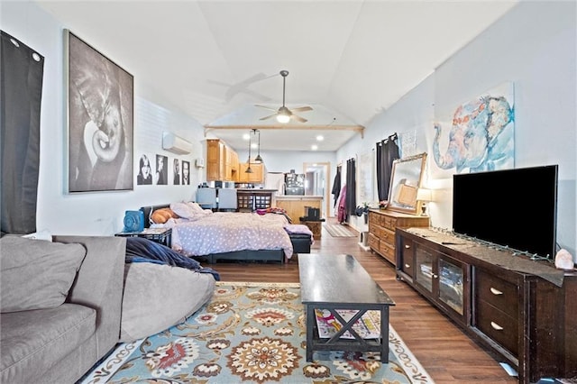 bedroom with lofted ceiling, wood finished floors, and an AC wall unit