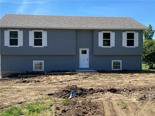 123 NW 171st Rd, Warrensburg, MO 64093 - bi-level home featuring roof with shingles