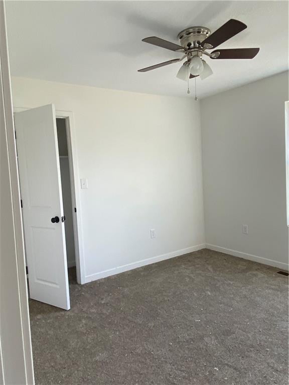 123 NW 171st Rd, Warrensburg, MO 64093 - carpeted spare room featuring a ceiling fan and baseboards
