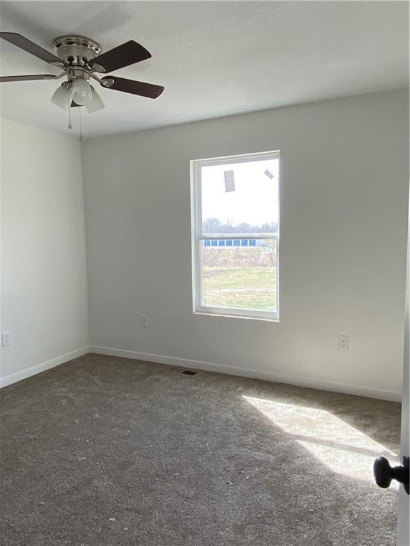 123 NW 171st Rd, Warrensburg, MO 64093 - carpeted spare room featuring a ceiling fan and baseboards
