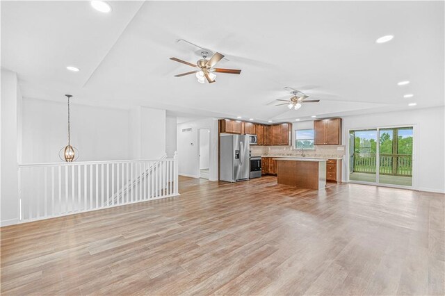 123 NW 171st Rd, Warrensburg, MO 64093 - unfurnished living room featuring ceiling fan, recessed lighting, a sink, light wood-type flooring, and baseboards
