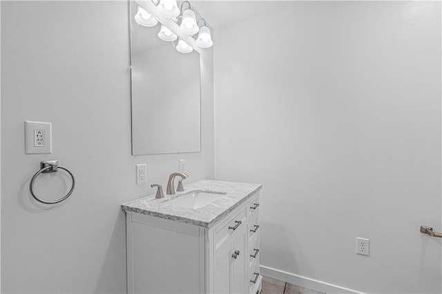 123 NW 171st Rd, Warrensburg, MO 64093 - bathroom with vanity, baseboards, and tile patterned flooring
