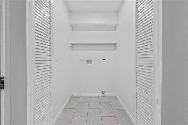123 NW 171st Rd, Warrensburg, MO 64093 - laundry room with hookup for an electric dryer, hookup for a washing machine, baseboards, and light tile patterned floors