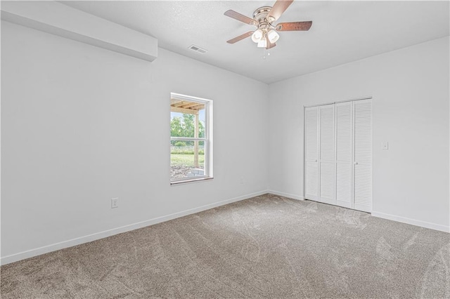 123 NW 171st Rd, Warrensburg, MO 64093 - unfurnished bedroom featuring carpet floors, baseboards, a closet, and ceiling fan