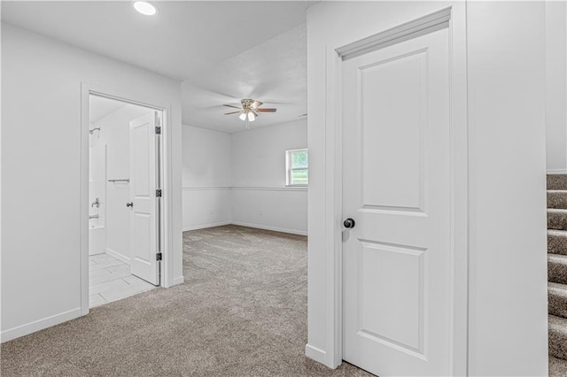 123 NW 171st Rd, Warrensburg, MO 64093 - spare room featuring carpet floors, ceiling fan, baseboards, stairway, and recessed lighting