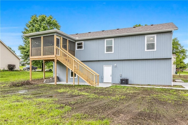 123 NW 171st Rd, Warrensburg, MO 64093 - back of house featuring a sunroom, stairs, a patio area, cooling unit, and a shingled roof