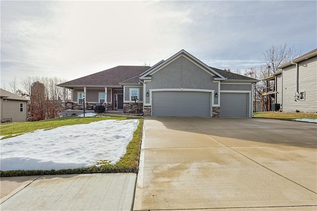 view of front of property with a garage