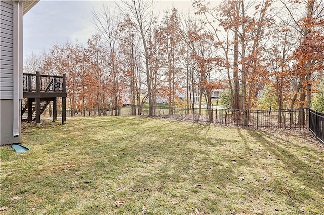 view of yard with a wooden deck