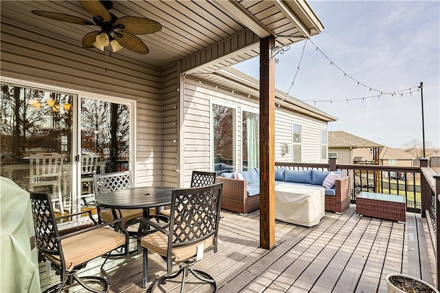 deck with ceiling fan and an outdoor hangout area