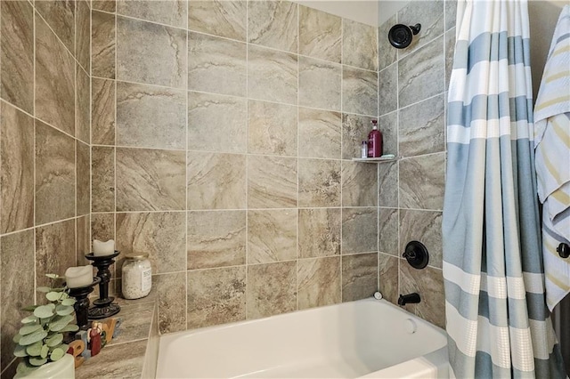 bathroom with shower / bath combo with shower curtain