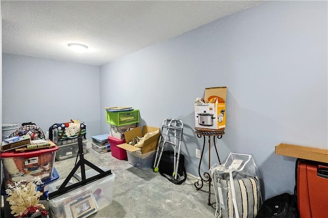 interior space featuring a textured ceiling