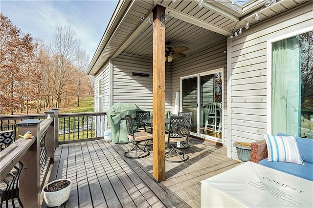 wooden terrace with ceiling fan