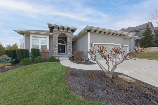 view of front of home featuring concrete driveway, stone siding, an attached garage, a front lawn, and stucco siding