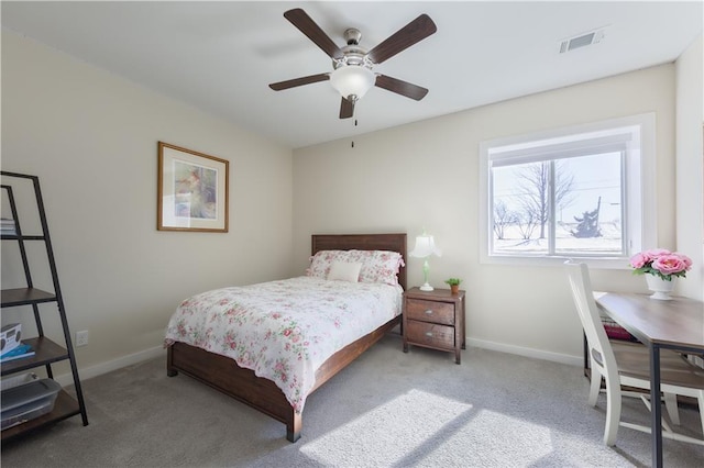 bedroom featuring baseboards, visible vents, and carpet flooring