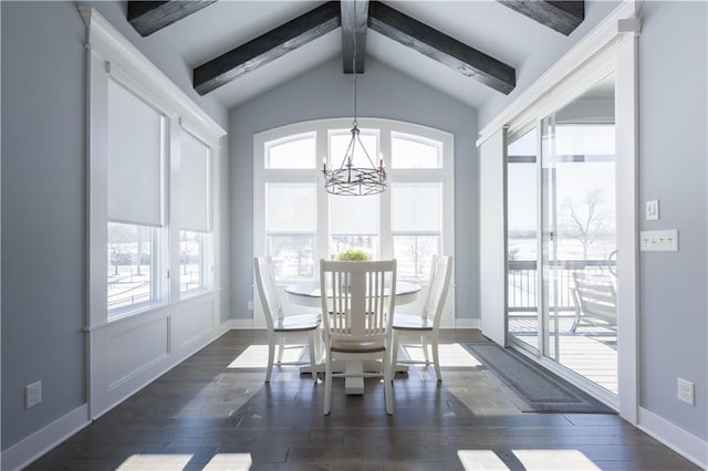 dining space with lofted ceiling with beams, baseboards, dark wood finished floors, and a notable chandelier