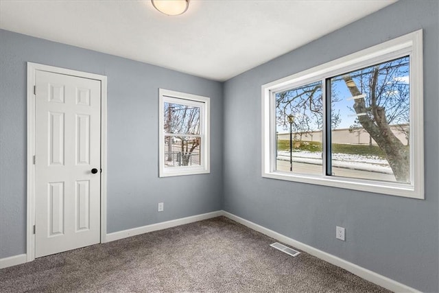 view of carpeted spare room