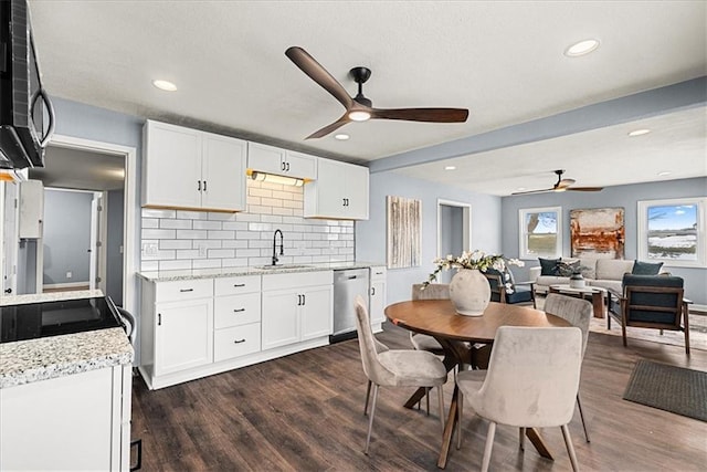 interior space with ceiling fan, sink, and dark hardwood / wood-style floors