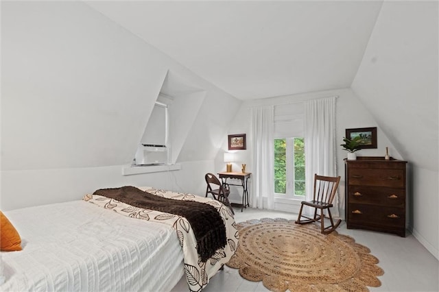 bedroom with lofted ceiling and cooling unit