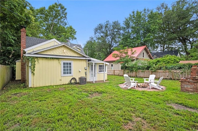 view of yard with an outdoor fire pit