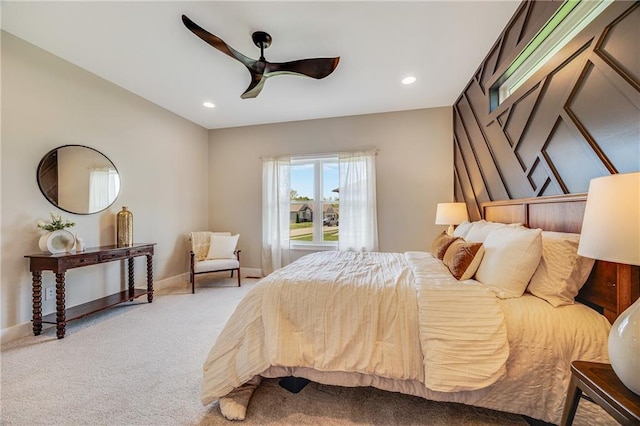 bedroom with recessed lighting, baseboards, light colored carpet, and ceiling fan