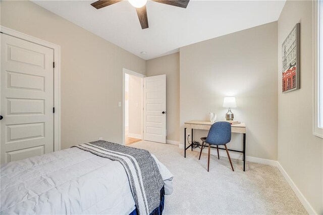 bedroom featuring baseboards, a ceiling fan, and carpet flooring