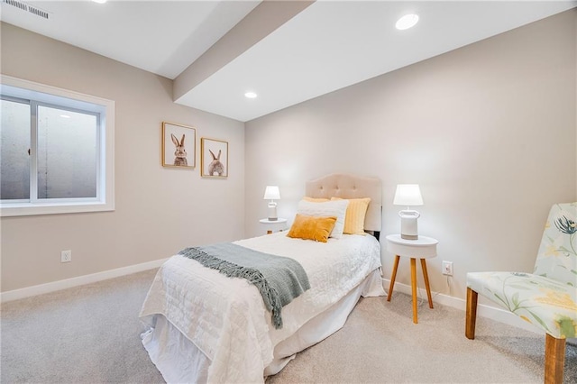 carpeted bedroom with baseboards, visible vents, and recessed lighting