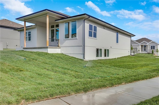 view of home's exterior featuring a lawn