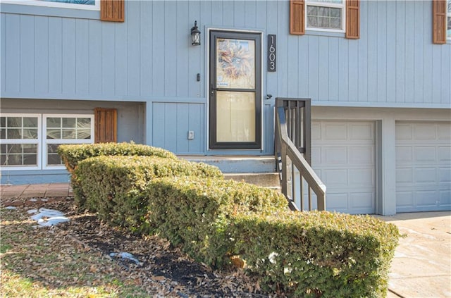 entrance to property featuring a garage