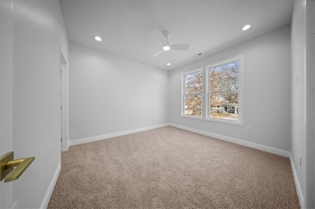 carpeted empty room with a ceiling fan, recessed lighting, and baseboards