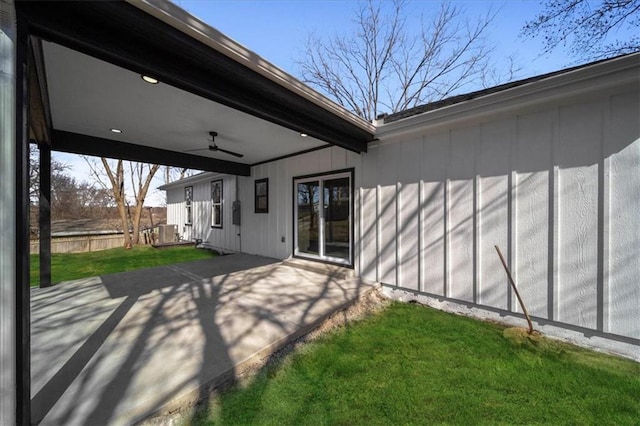 exterior space featuring a yard, a patio area, and ceiling fan