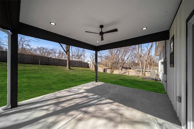 view of patio / terrace with a fenced backyard and ceiling fan