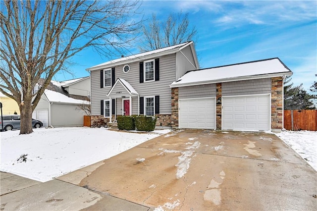 view of front of property with a garage