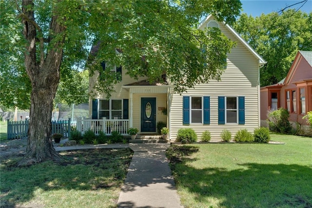 view of front of home with a front lawn