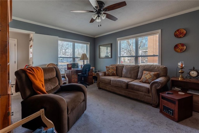 carpeted living room featuring ornamental molding and ceiling fan