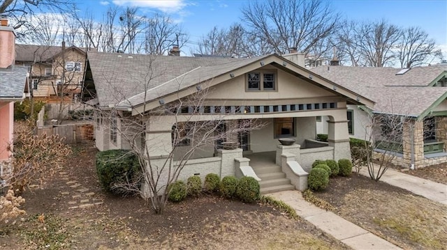 view of front of home featuring covered porch