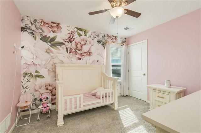 bedroom featuring ceiling fan and light colored carpet