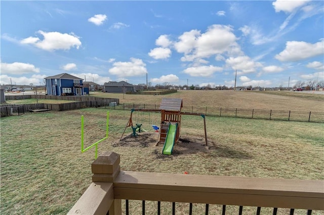 view of yard featuring a rural view and a playground