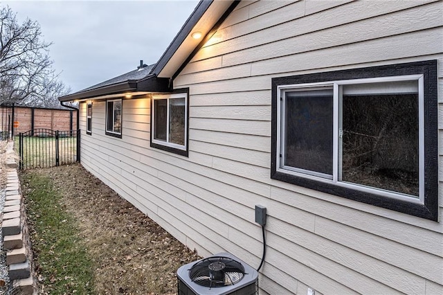 view of property exterior with central air condition unit