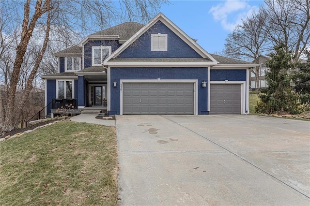 view of front of property featuring a garage