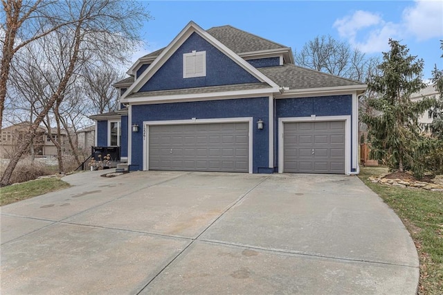 view of front of property featuring a garage