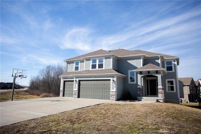 view of front facade featuring a garage and a front yard